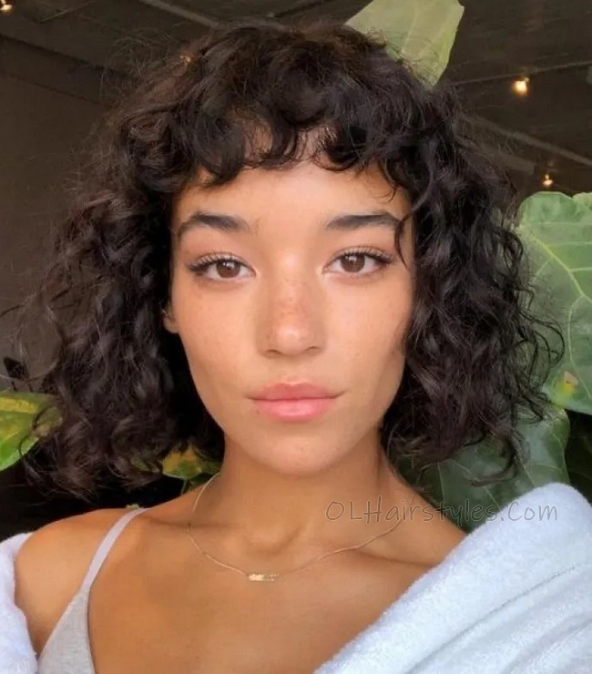 SHORT HAIRSTYLE WITH CURLY BANGS