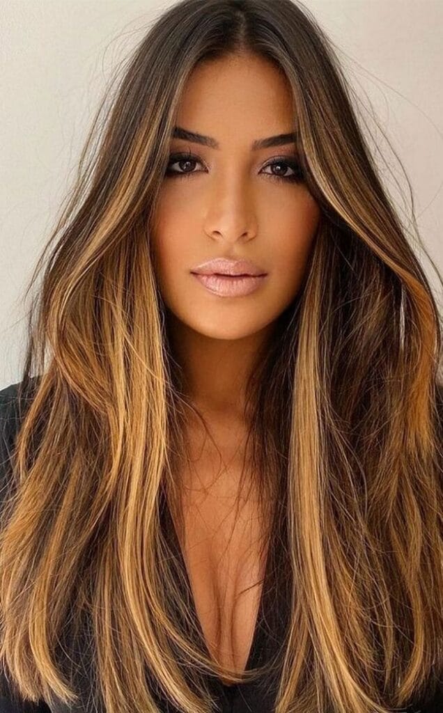 honey-balayage-on-long-straight-hair-with-slightly-tucked-in-curls-4058344-3887192