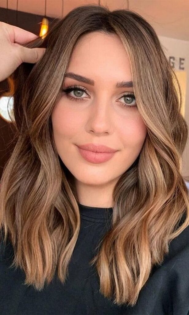 honey-balayage-on-long-wavy-copper-brown-hair-with-center-parting-8535841-5827932