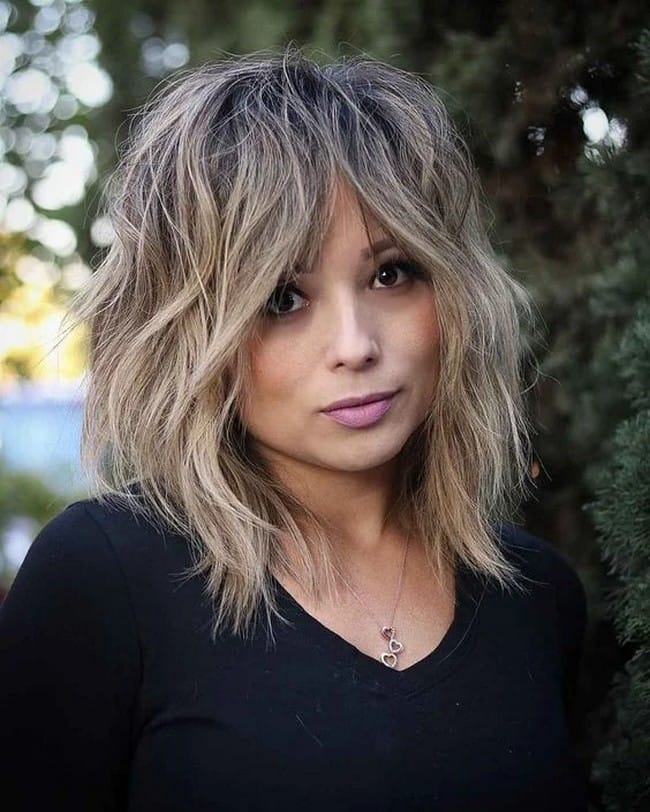 mid-length-blonde-gray-slightly-wavy-layered-cut-hair-9164143-4074513