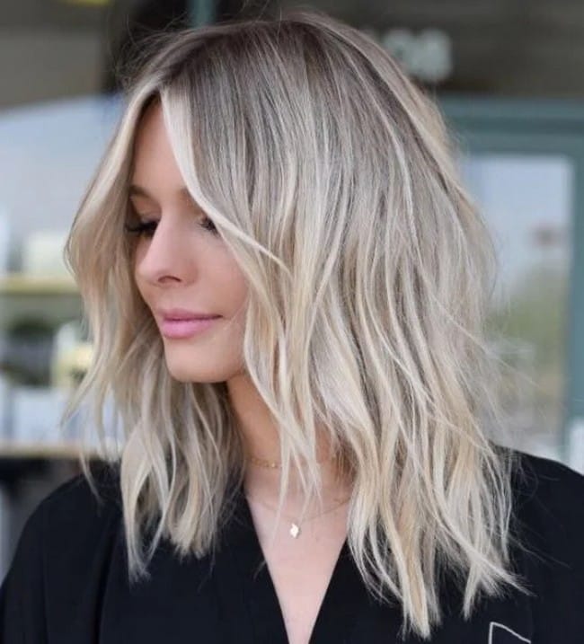 mid-length-layered-cut-on-cascading-blonde-hair-9852989-7555688