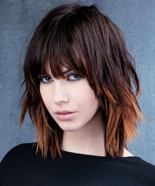 mid-length-layered-hair-on-a-plunging-bob-with-straight-ends-in-auburn-color-3376760-7064525