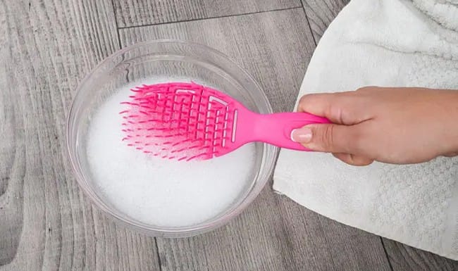 wash-the-brush-with-soapy-water-8570991